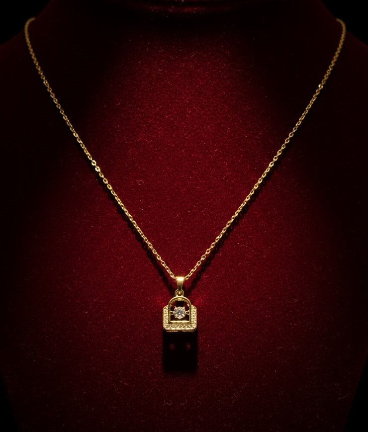 Radiant Heart Lock Charm